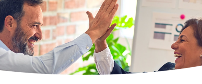 Colleagues high-fiving